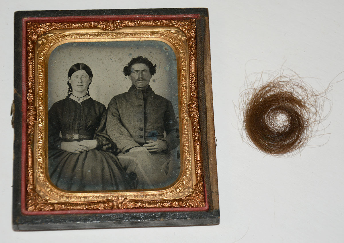 1/4-PLATE AMBROTYPE OF UNIDENTIFIED CONFEDERATE SOLDIER AND WOMAN, WITH A LOCK OF HAIR