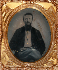 9th PLATE CASED TINTYPE OF SOLDIER IN PATRIOTIC MAT: “THE UNION NOW AND FOREVER.”