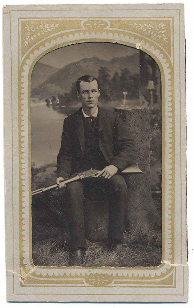 1880s TINTYPE OF MAN WITH WHITNEY-KENNEDY RIFLE