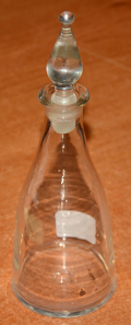 SMALL ANTIQUE CLEAR GLASS DECANTER WITH TEARDROP STOPPER	