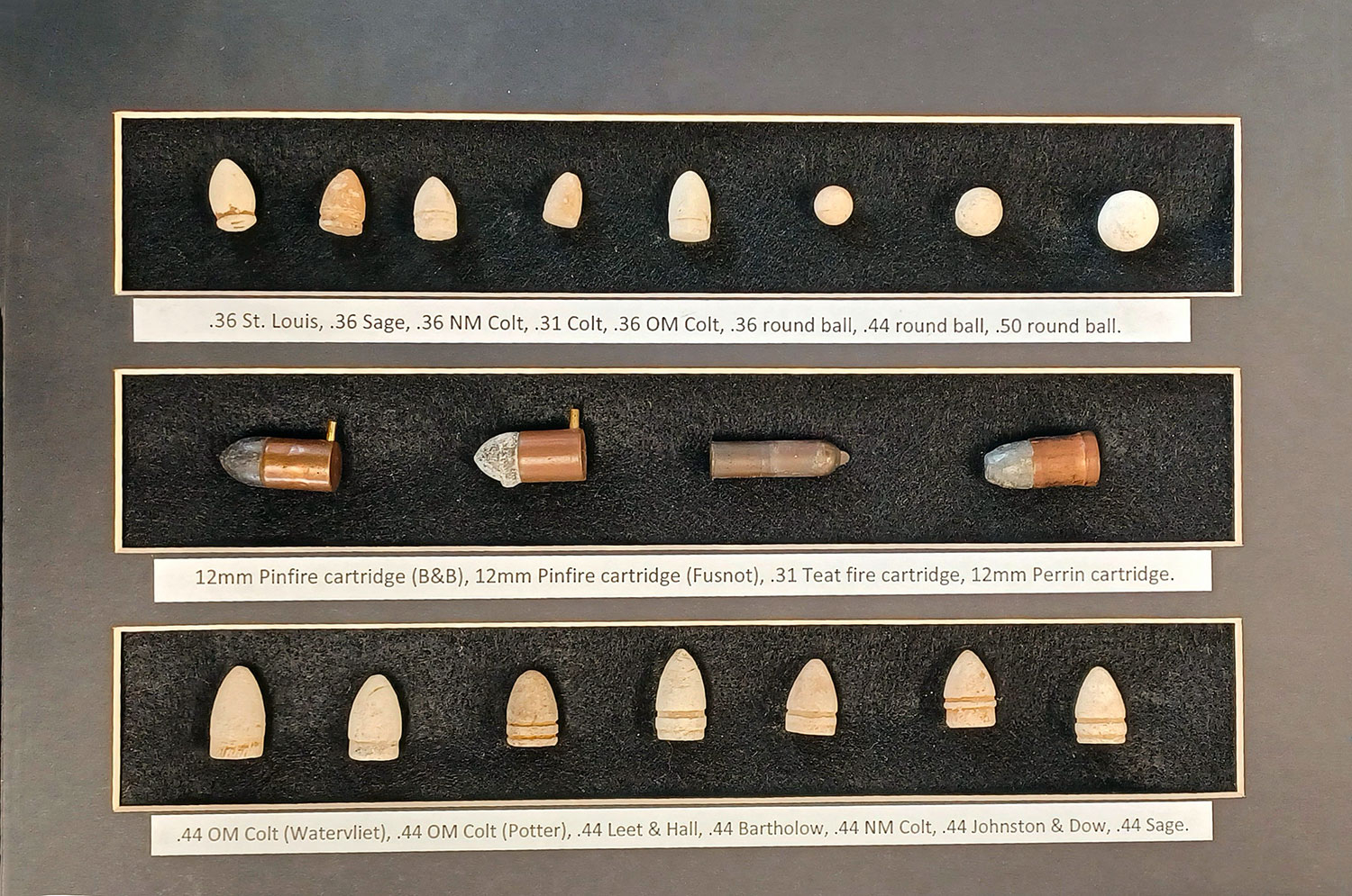 DISPLAY OF CIVIL WAR PISTOL AND REVOLVER BULLETS AND CARTRIDGES