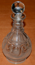 EARLY TO MID 19TH CENTURY GLASS DECANTER WITH MOLDED BASE