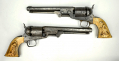 PAIR OF CONSECUTIVELY NUMBERED IVORY-GRIPPED LARGE IRON-TRIGGERGUARD COLT M1851 NAVIES