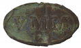 EXCAVATED BRASS FACE OF “VMM” OVAL PLATE