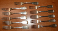 SET OF ELEVEN SILVER FORKS BY “W.M. SAVAGE” OF COLUMBUS, OHIO