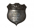 CIVIL WAR SILVER IDENTIFICATION SHIELD OF (ALIAS) CHARLES H. LEONARD, NEW HAMPSHIRE HEAVY ARTILLERY: SAILOR, SOLDIER, SCOUNDREL