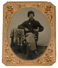 QUARTER-PLATE TINTYPE OF A SERIOUS SOLDIER SMOKING A MEERSCHAUM PIPE 